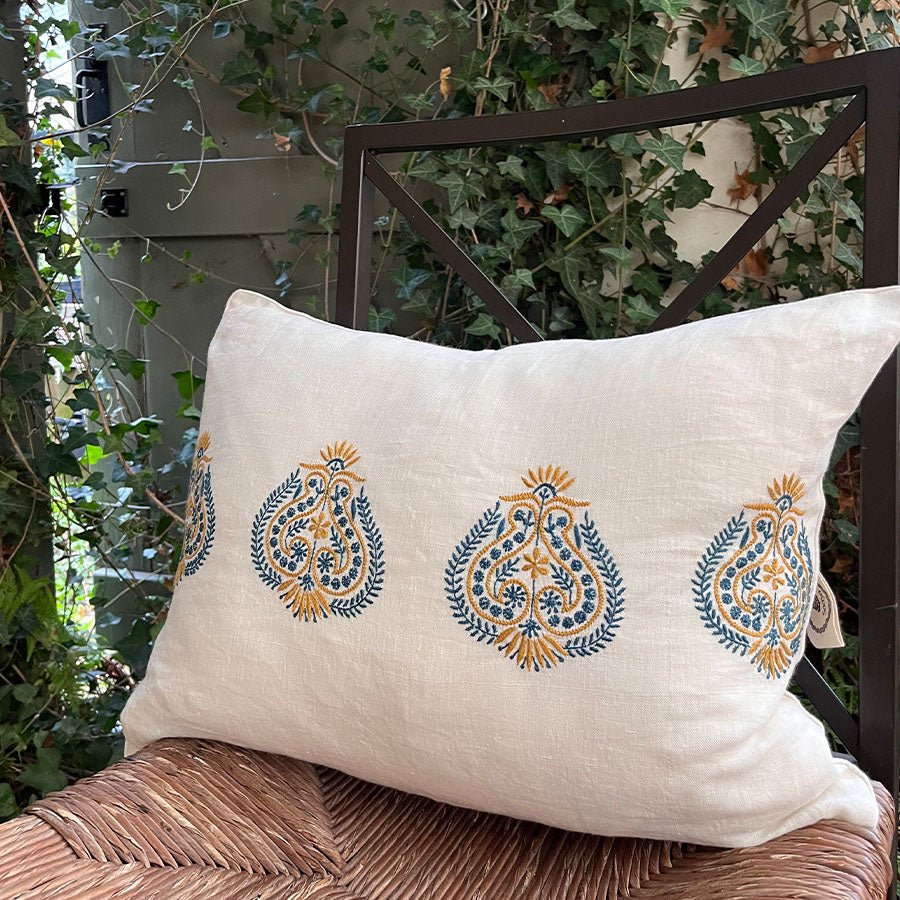 Kesar Chikankari cushion cover in off white with blue and mustard hand embroidery