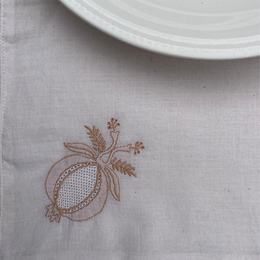 Hand embroidered linen anaar bloom chikanakri placemats by Saaya