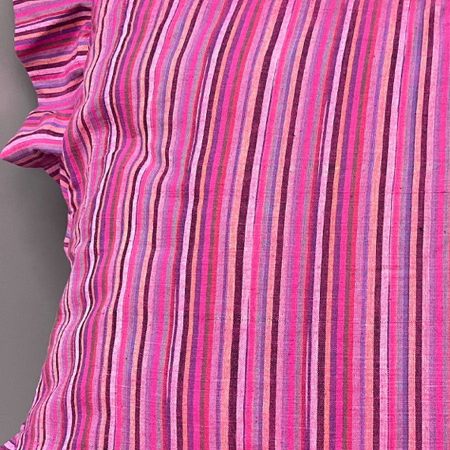Close-up of cushion cover with pink striped pattern
